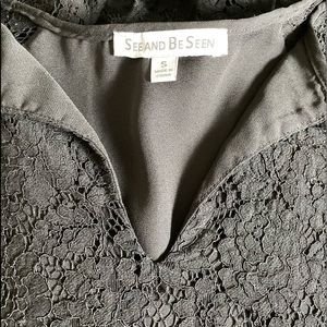 black lace top with slightly belled half sleeves